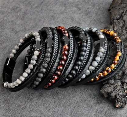 Nye, lekre Lavasten armbånd med skinn ...Triple Row m/kors i Hematitt, justerbare ledd