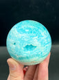 Blue Aragonite Sphere: Natural Hole Crystal Display, 380 gram
