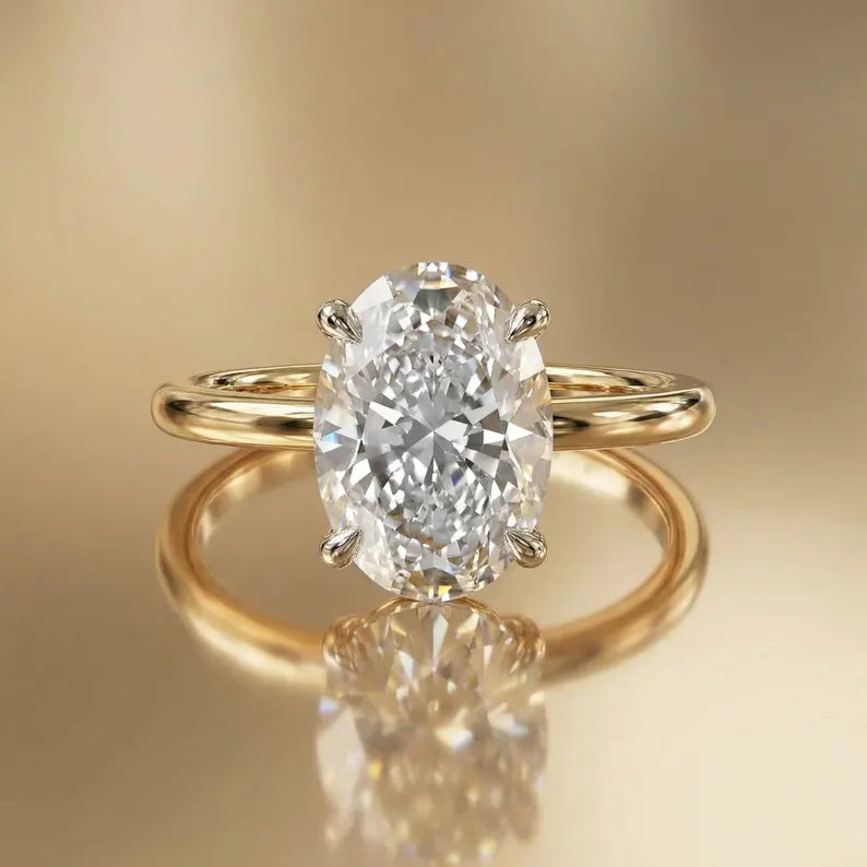Vakker og Mareshia "Solitaire" enstens 10x8mm Simulated Diamond CZ Ring, Gold Vermeil ( 925s Silver )