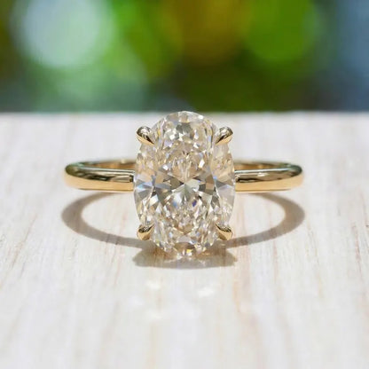 Vakker og Mareshia "Solitaire" enstens 10x8mm Simulated Diamond CZ Ring, Gold Vermeil ( 925s Silver )