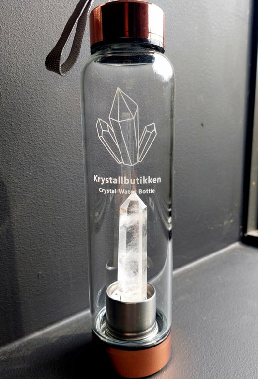 Vannbeholder 0.6liter flaske i glass med Klar Kvarts ( Bergkrystall) Tårnkrystall